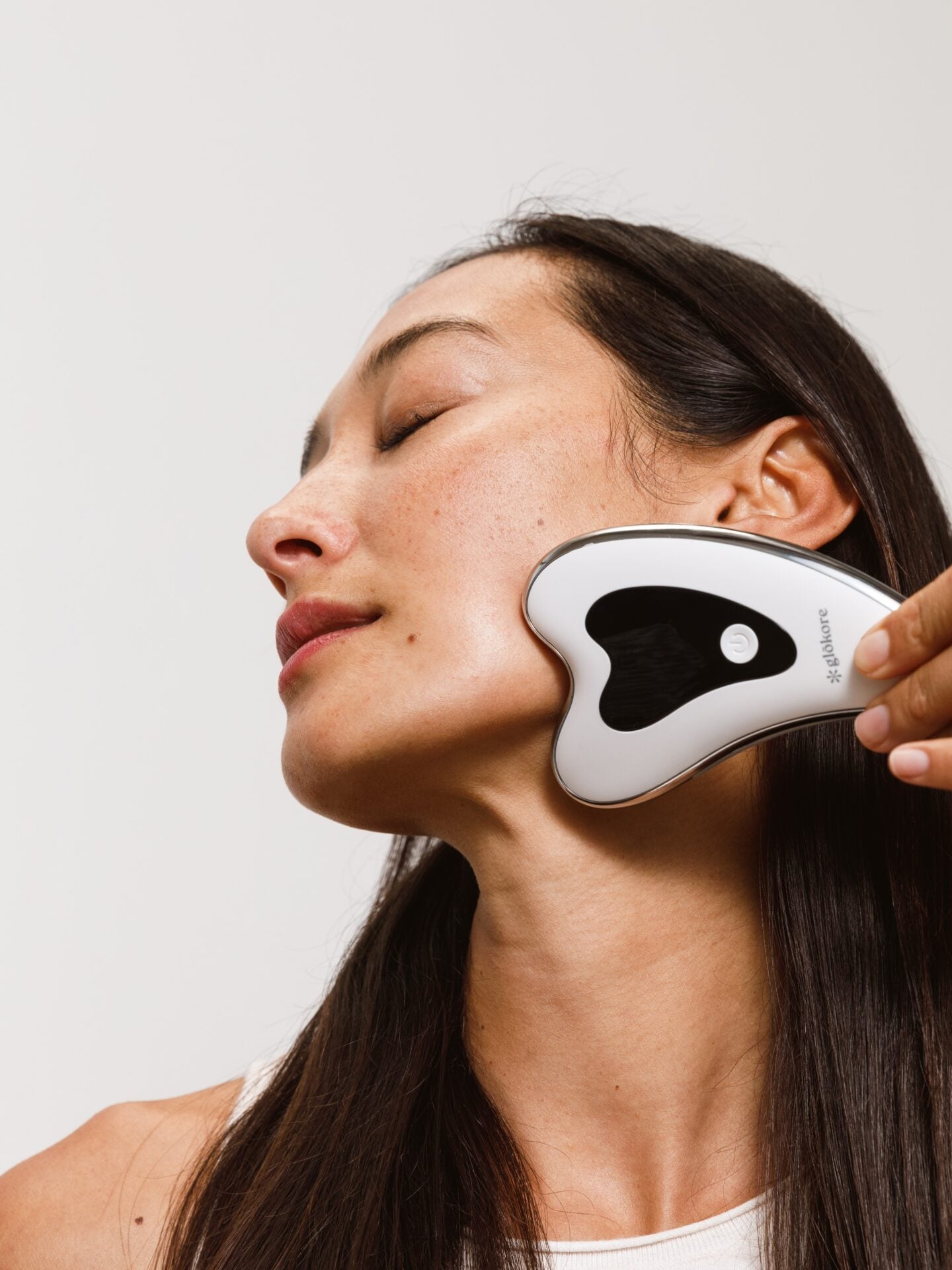 Glokore electric Gua Sha beauty tool promoting blood circulation