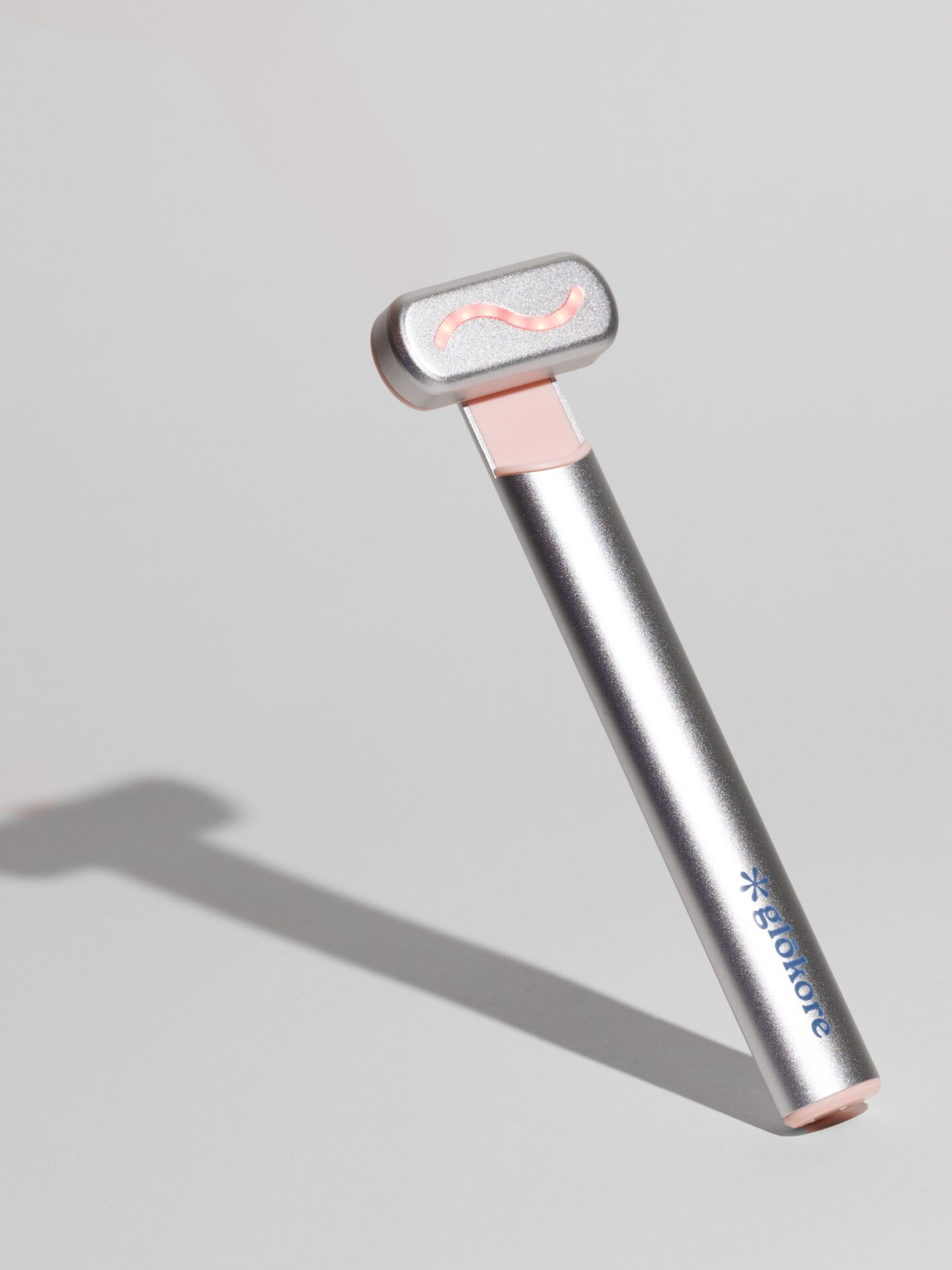 Portable red light facial therapy device for skin tightening and rejuvenation