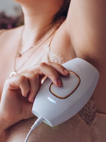 Handheld intense pulsed light hair removal device designed to reduce hair regrowth at home